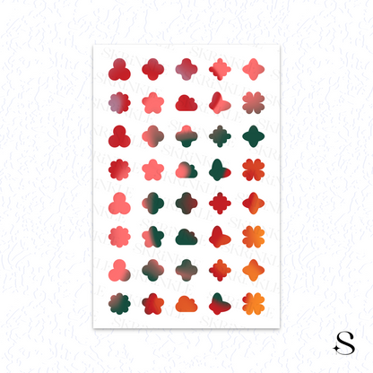 Sheet of colorful flower-shaped cute journal stickers on a white background