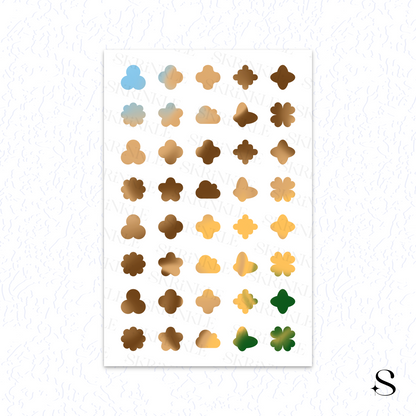 Sheet of decorative stickers with various shapes and colors on a white background, cute journal stickers